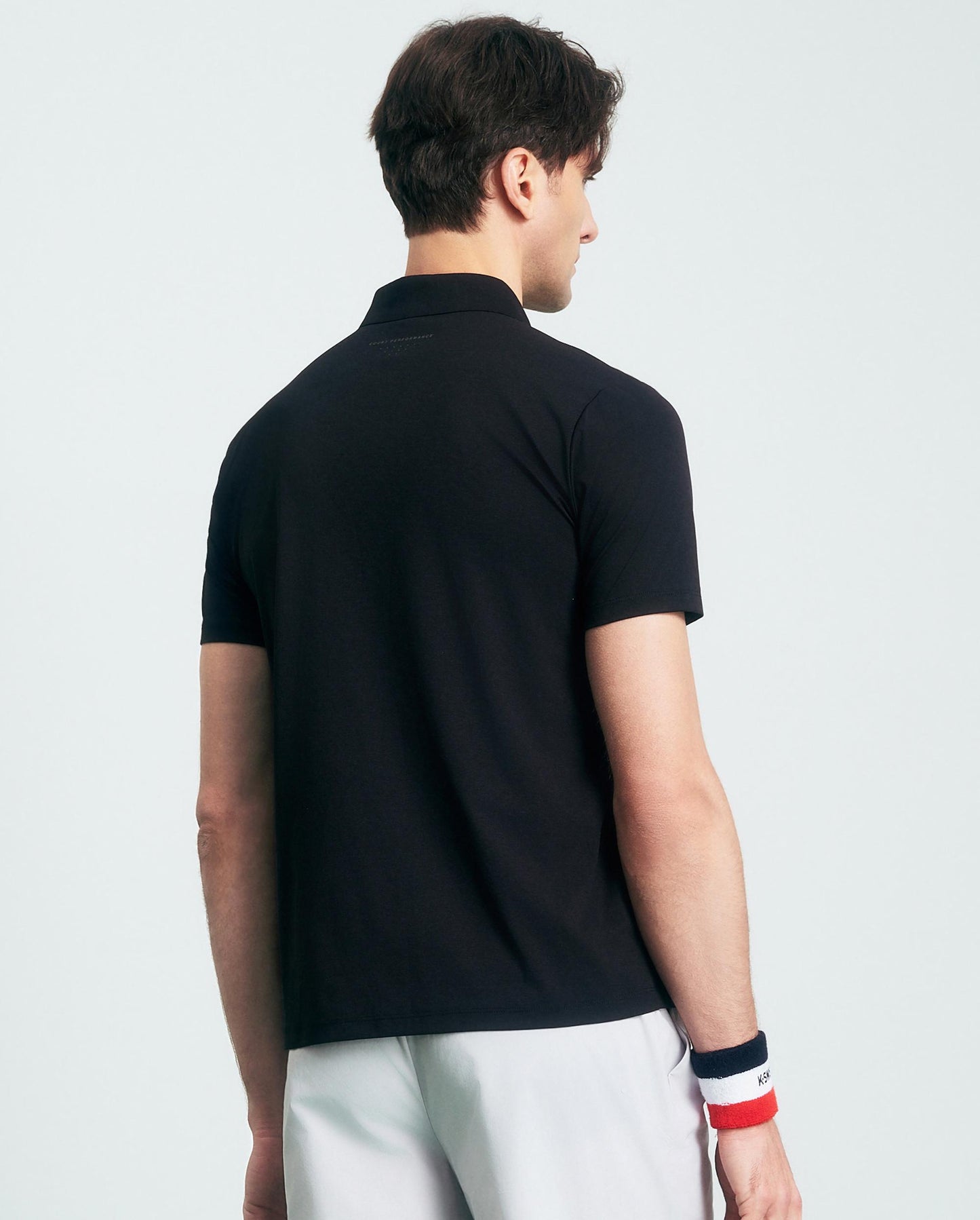 1011571-008 | HERREN UPF50+ SCHWEISSABLEITENDES SCHNELL TROCKNENDES POLOSHIRT | SCHWARZ