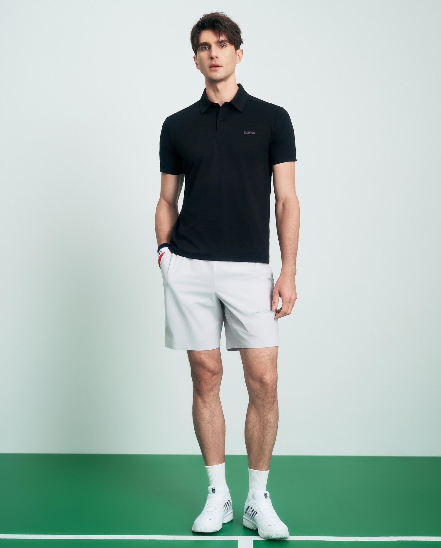 1011571-008 | HERREN UPF50+ SCHWEISSABLEITENDES SCHNELL TROCKNENDES POLOSHIRT | SCHWARZ